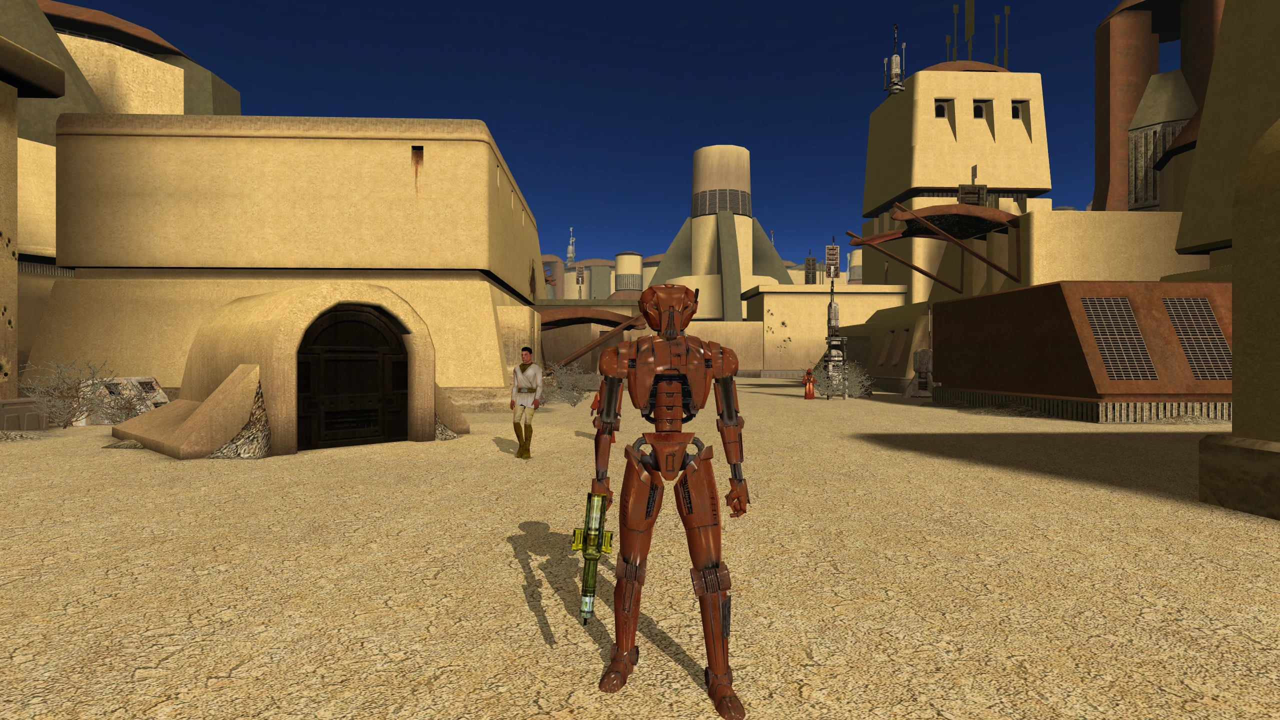 HK-47 on Tatooine, missing his eyes and metallic details.